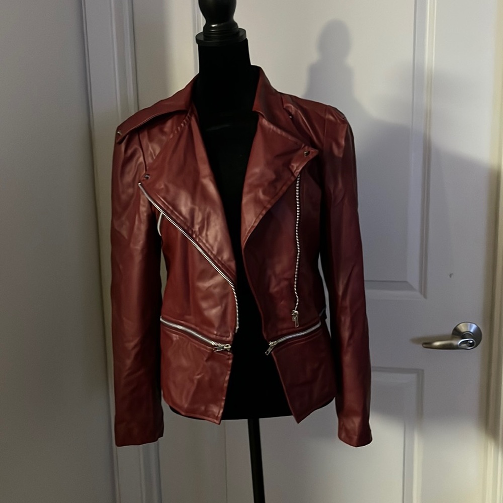 Size medium red faux leather jacket with removable peplum